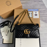 Side profile of refined polished women's handbag – women's luxury accessory