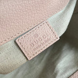 Side profile of modern chic women's handbag – women's luxury accessory