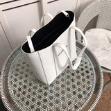 Interior view of structured elevated women's handbag – women's designer-style accessory