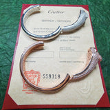 Front view of Cartier unisex jewelry piece