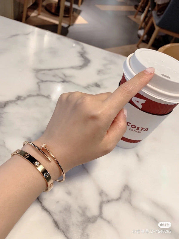 Side view of Cartier unisex jewelry piece