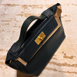 Understated bag shown from front angle