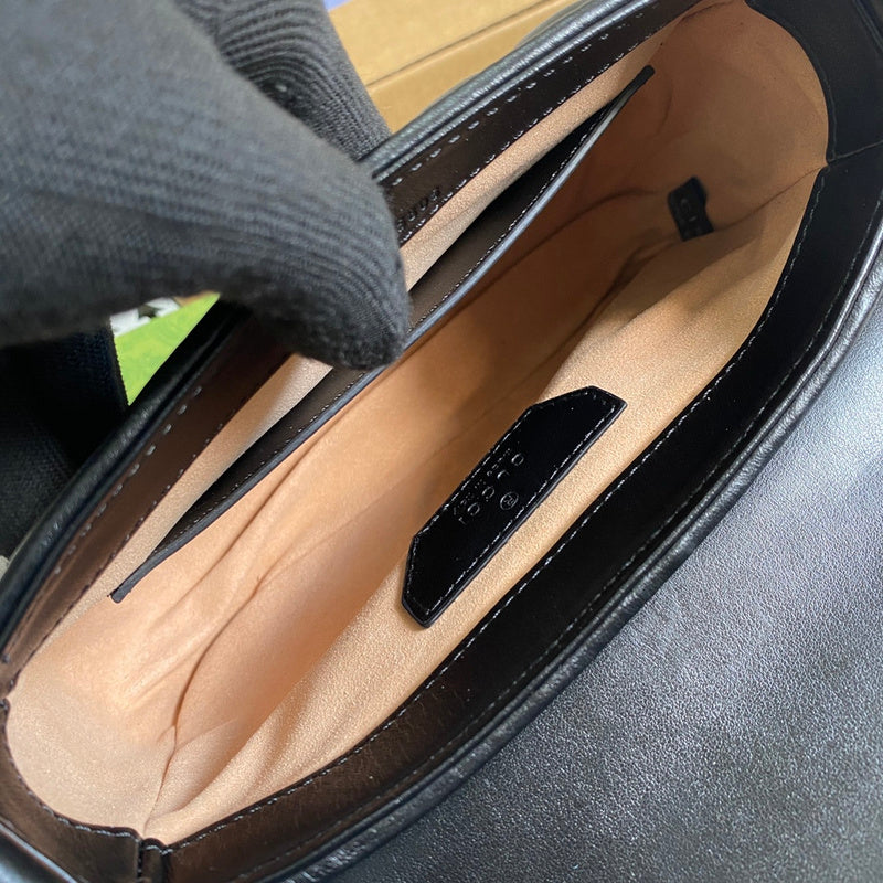 Close-up detail of refined signature women's handbag – women's luxury accessory