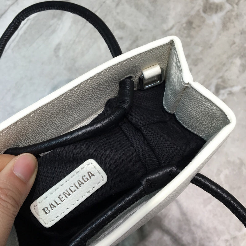 Effortless Faux Leather Handbag - Statement Silhouette | Women's Fashion Handbag #1076 - alternate angle view (image 8) of designer-inspired handbag