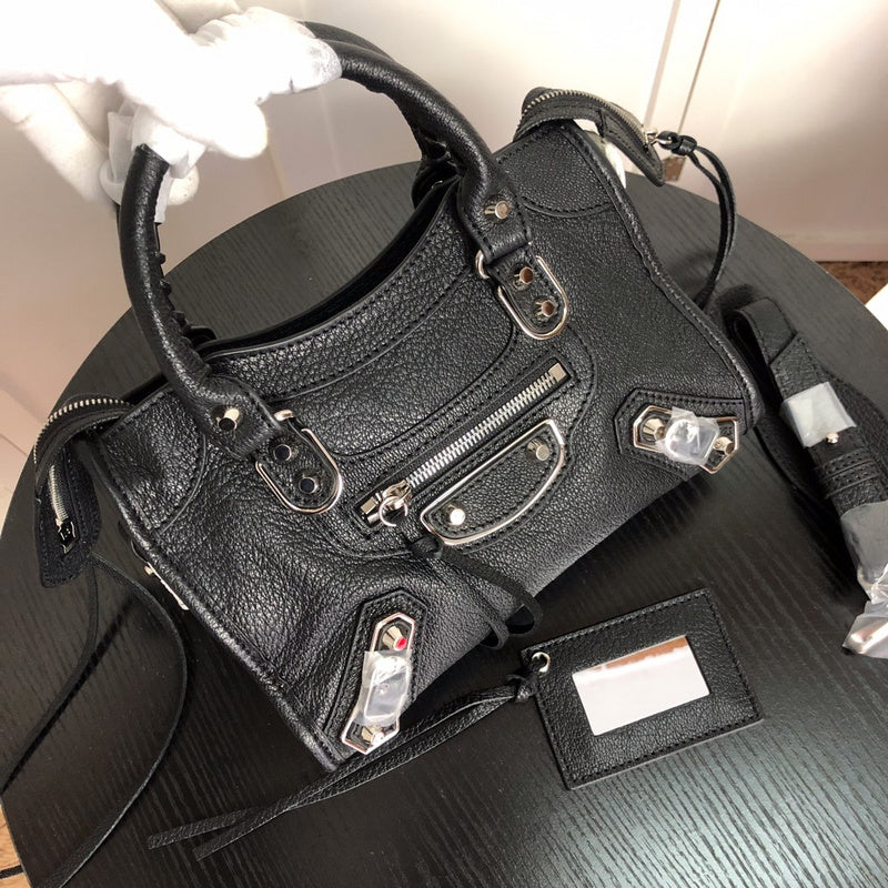 Front view of elevated polished women's handbag – women's luxury accessory