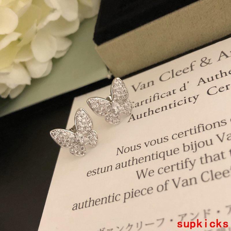 Lifestyle view of Van Cleef & Arpels unisex jewelry piece