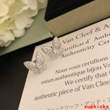 Lifestyle view of Van Cleef & Arpels unisex jewelry piece