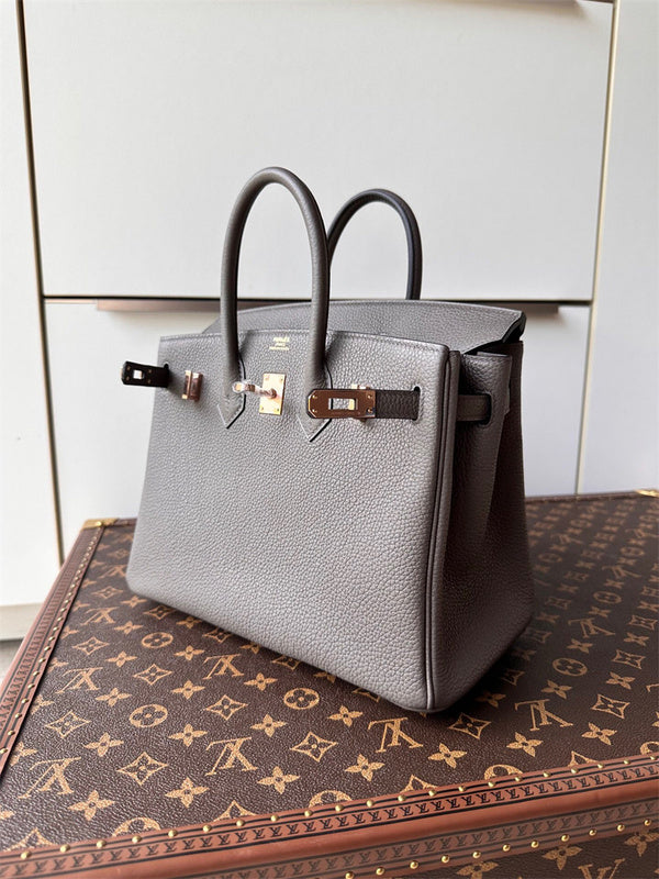  polished top-handle bag detail view showing craftsmanship