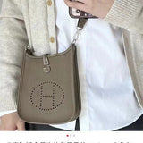 Side view of elegant structured handbag