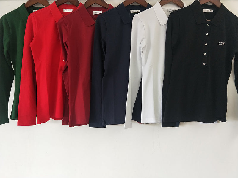 Close-up detail shot of Lacoste luxury clothing with logo-detail design