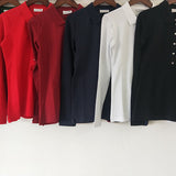 Close-up detail shot of Lacoste luxury clothing with logo-detail design