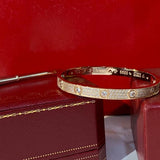 Front view of Cartier unisex jewelry piece