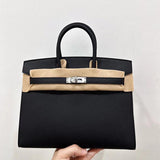 Side view of refined structured handbag