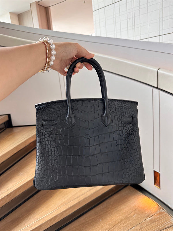  Graceful structured bag carried on shoulder 16