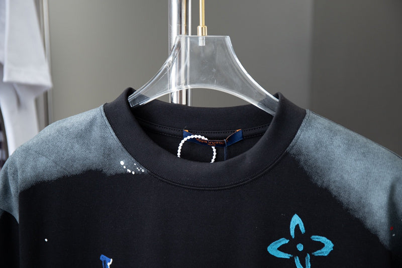 Close-up detail shot of Louis Vuitton cotton t-shirt with monogram-inspired silhouette