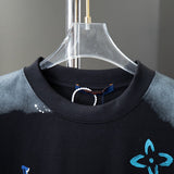 Close-up detail shot of Louis Vuitton cotton t-shirt with monogram-inspired silhouette