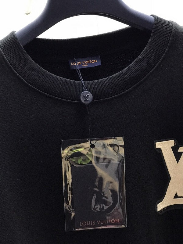 Front view of Louis Vuitton luxury clothing with streetwear-inspired cut