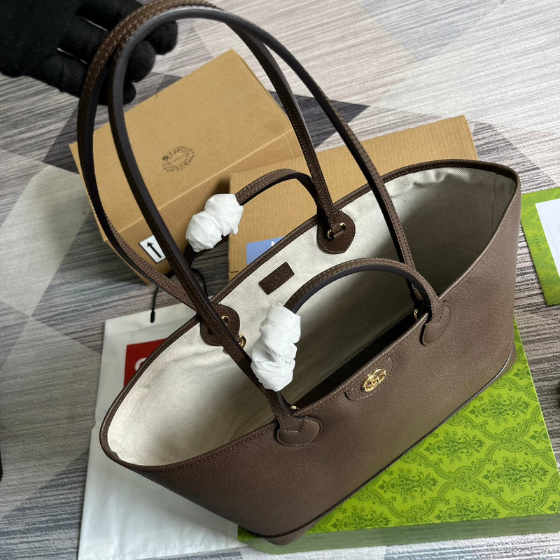 Close-up detail of polished modern women's handbag – women's luxury accessory