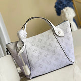 Close-up detail of structured sleek women's handbag – women's designer-style accessory