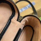 Close-up detail of classic elevated women's handbag – women's luxury handbag