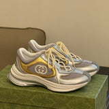 Gucci Luxury sneakers in tonal black padded collar comfort front view