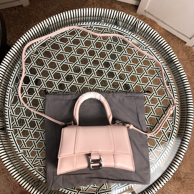 Styled lifestyle shot of refined elevated women's handbag – women's premium purse
