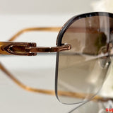 Side view of Cartier unisex sunglasses
