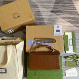 Styled lifestyle shot of everyday-luxe structured women's handbag – women's luxury accessory
