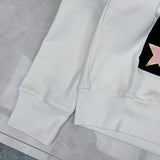 Flat lay presentation of Gucci luxury clothing with logo-detail design