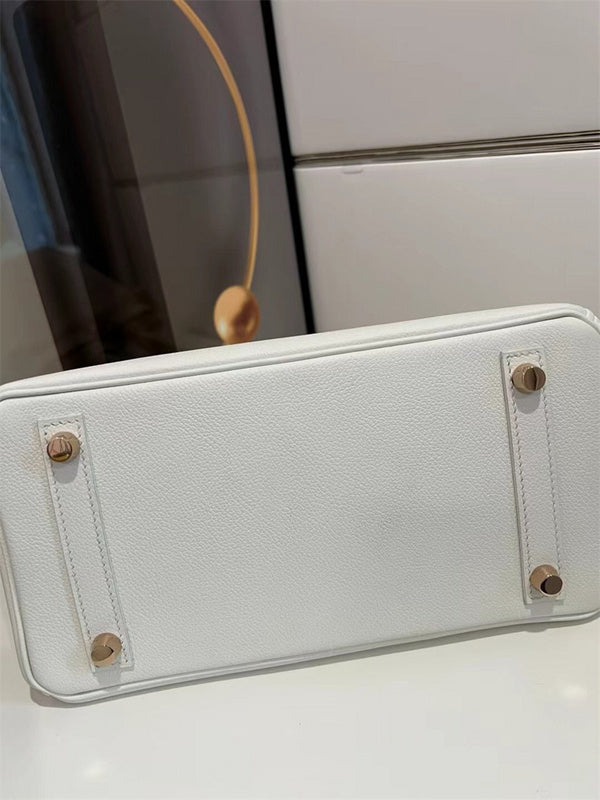  Clean-Lined satchel carried on shoulder