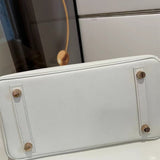 Clean-Lined satchel carried on shoulder