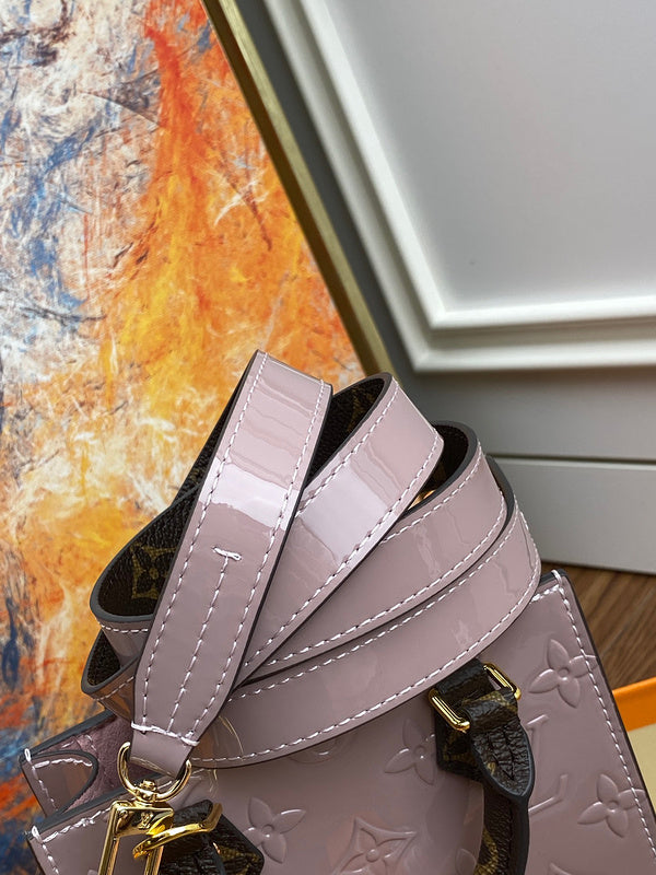 Side profile of polished chic women's handbag – women's statement bag