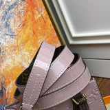 Side profile of polished chic women's handbag – women's statement bag
