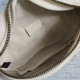 Side profile of classic signature women's handbag – women's statement bag