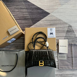 Front view of sleek elevated women's handbag – women's designer-style accessory