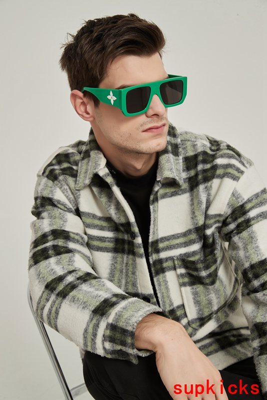 Close-up detail view of Louis Vuitton unisex sunglasses
