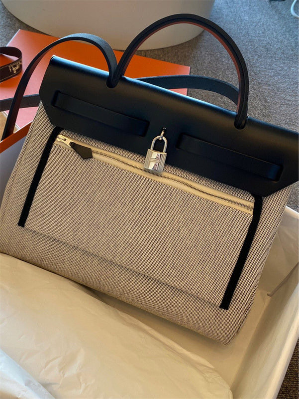  Sleek tote bag carried on shoulder