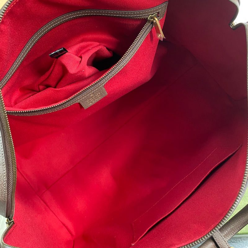 Side profile of statement polished women's handbag – women's luxury accessory