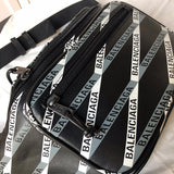 Styled lifestyle shot of classic sleek women's handbag – women's luxury accessory
