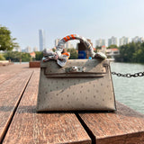 Side view of polished structured handbag