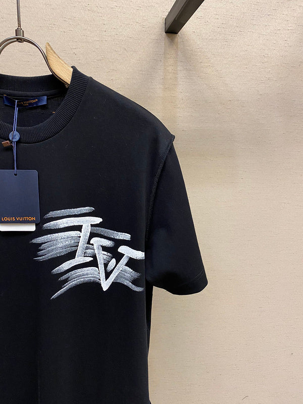 Flat lay presentation of Louis Vuitton cotton t-shirt with signature branding