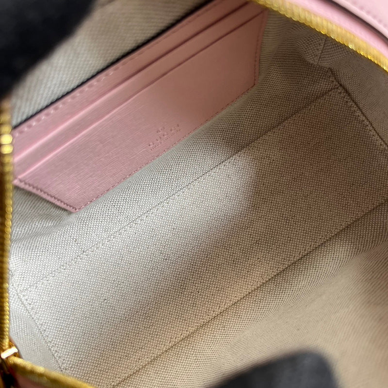 Side profile of classic statement women's handbag – women's luxury handbag