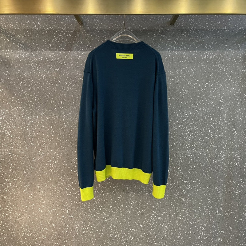 Side profile of Louis Vuitton luxury clothing with label-forward styling