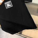 Burberry t-shirt styling view — premium authentic designer style