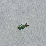 Close-up detail shot of Lacoste luxury clothing with logo-detail design