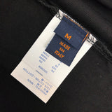 Flat lay presentation of Louis Vuitton cotton t-shirt with logo-detail design