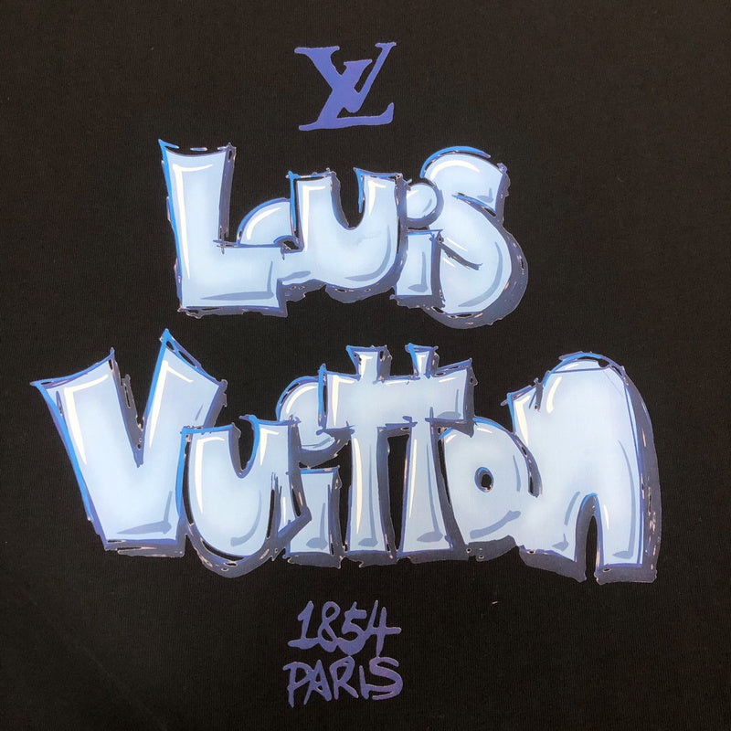 Full styled look of Louis Vuitton cotton t-shirt with label-forward styling