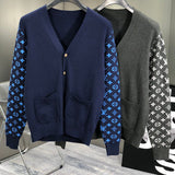Close-up detail shot of Louis Vuitton luxury clothing with signature branding