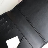 Styled lifestyle shot of signature premium women's handbag – women's designer-style accessory