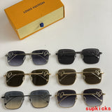 Close-up detail view of Louis Vuitton unisex sunglasses